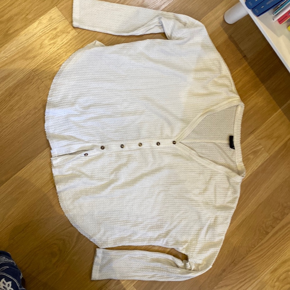 Urban Outfitters out from under loose fitting button down shirt